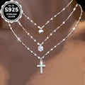 A Set of 3 Elegant 925 Sterling Silvery - Lip Cross Necklaces with Dazzling Cubic Synthetic Zirconia and Heart - Shaped Pendants. A Combination of Shiny Coconut - Snowflake Chains and Cubic Synthetic Zirconia Necklaces. It's the Perfect Gift