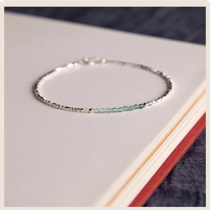A Delicate Women'S Bracelet Made of 925 Silvery with a Fine Silvery Aquamarine Design, Showcasing a Light Luxury Aesthetic And a Unique Broken Style