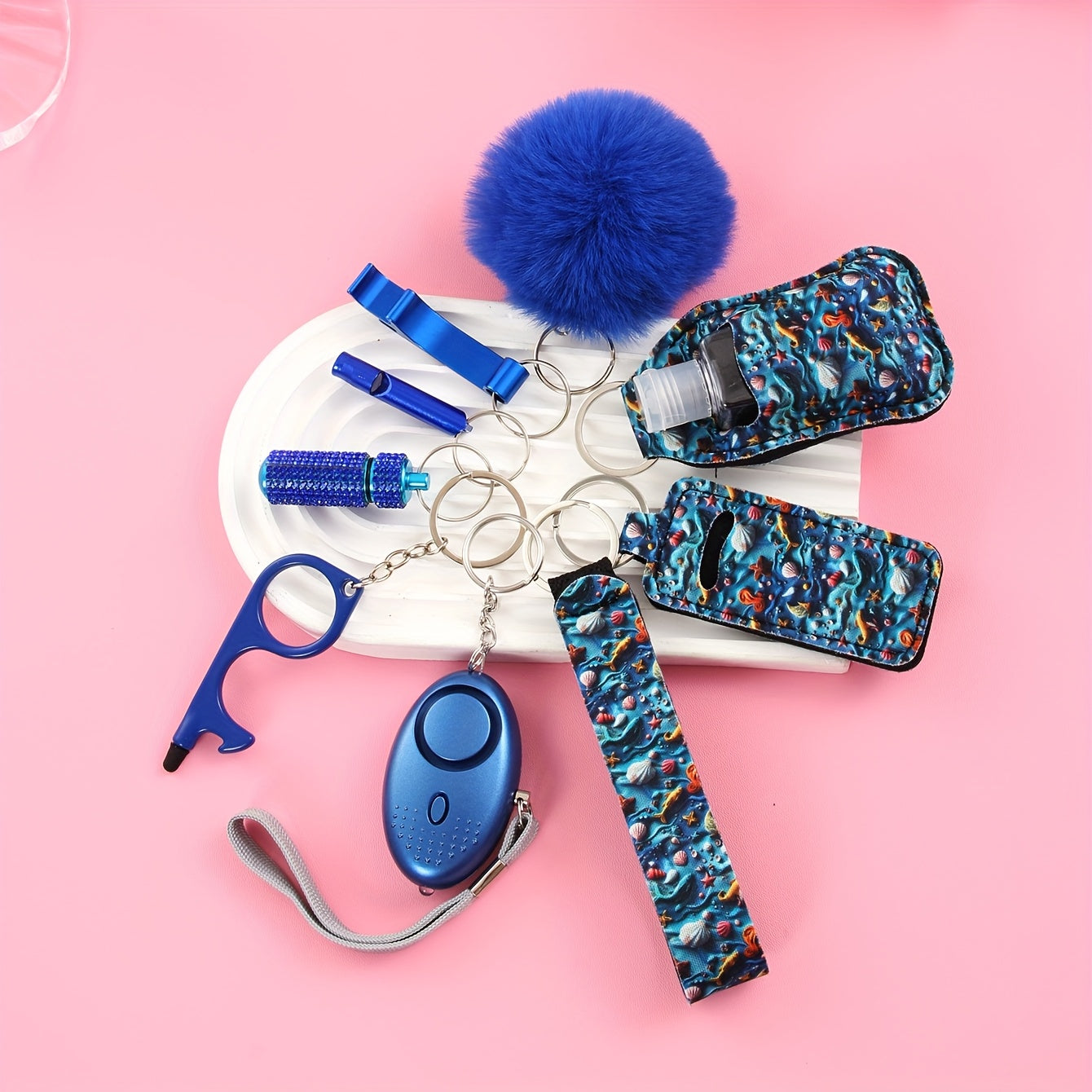 UNISEX Safety Keychain Set. Gift Box Set With 9 Cute Keychains For Ladies, Including Pom-poms, Personal Alarms, Bottle Openers, Rhinestone Shiny First Aid Kits And Survival Whistles. For Daily Use And Holiday Gift Giving