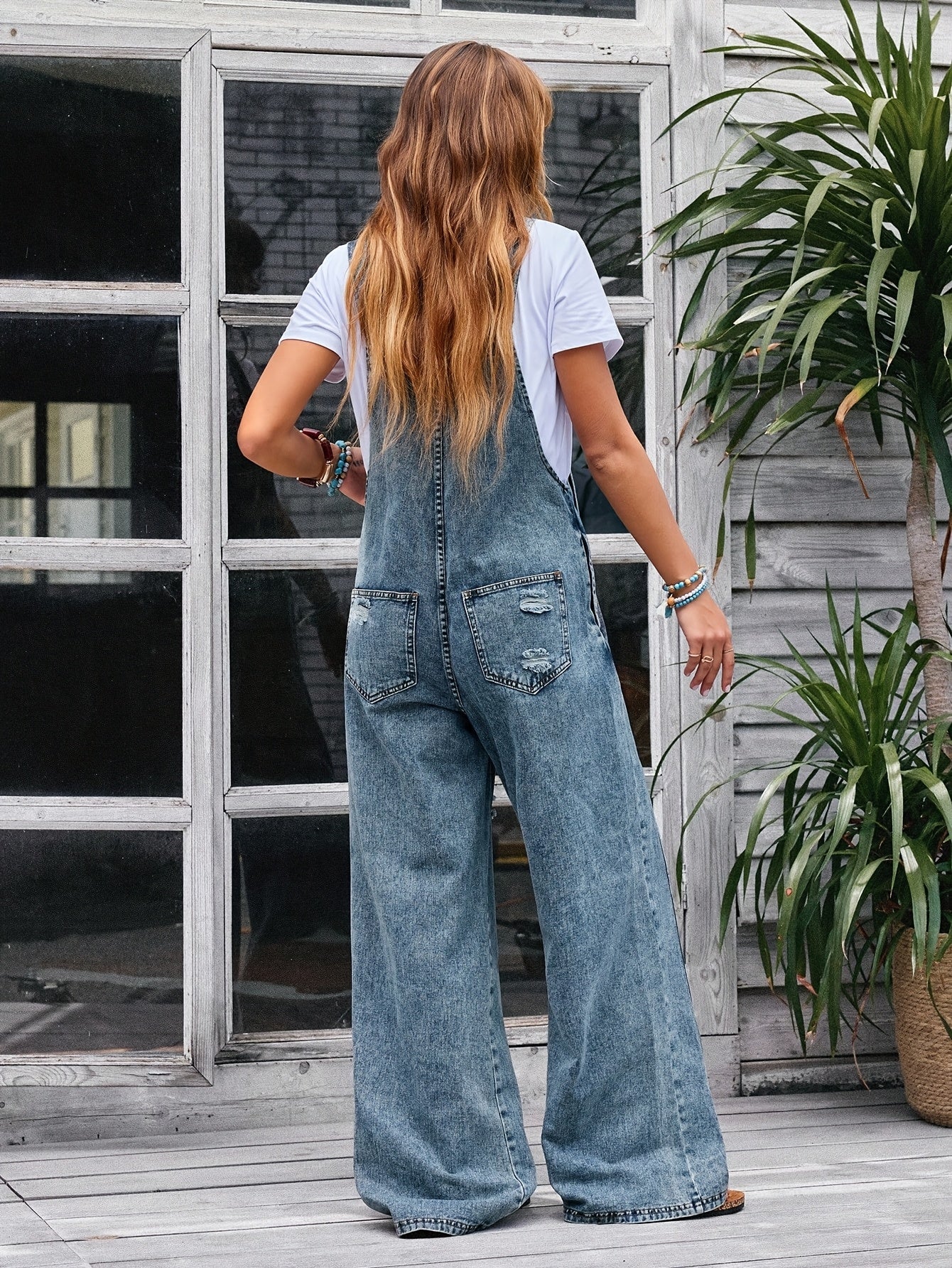 Women's Denim Jumpsuit - Wide Leg Pocket Detail detail view