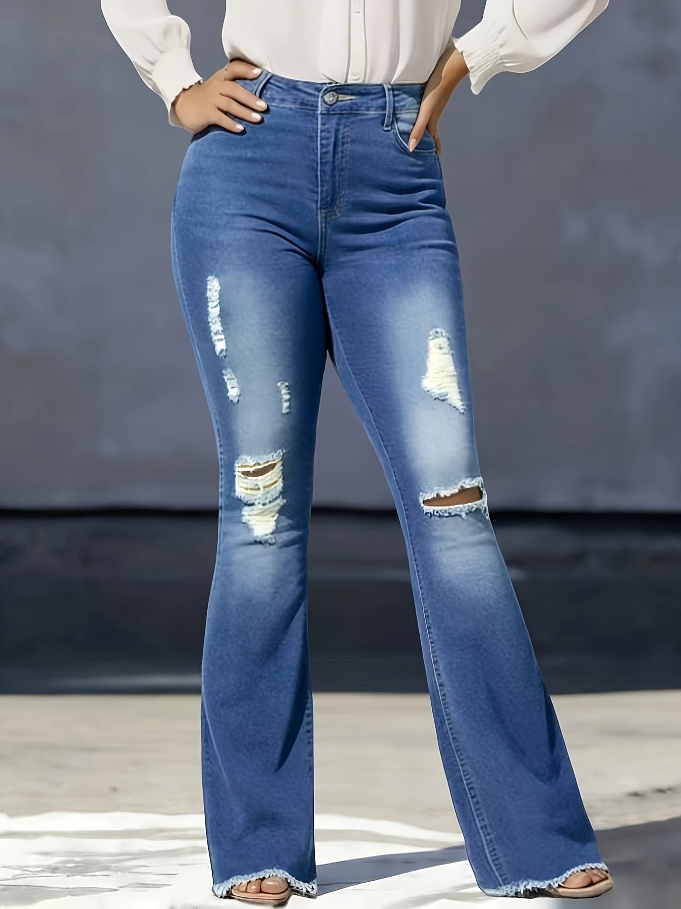 Women's Mid-Rise Flare Jeans - Medium Blue Distressed detail view