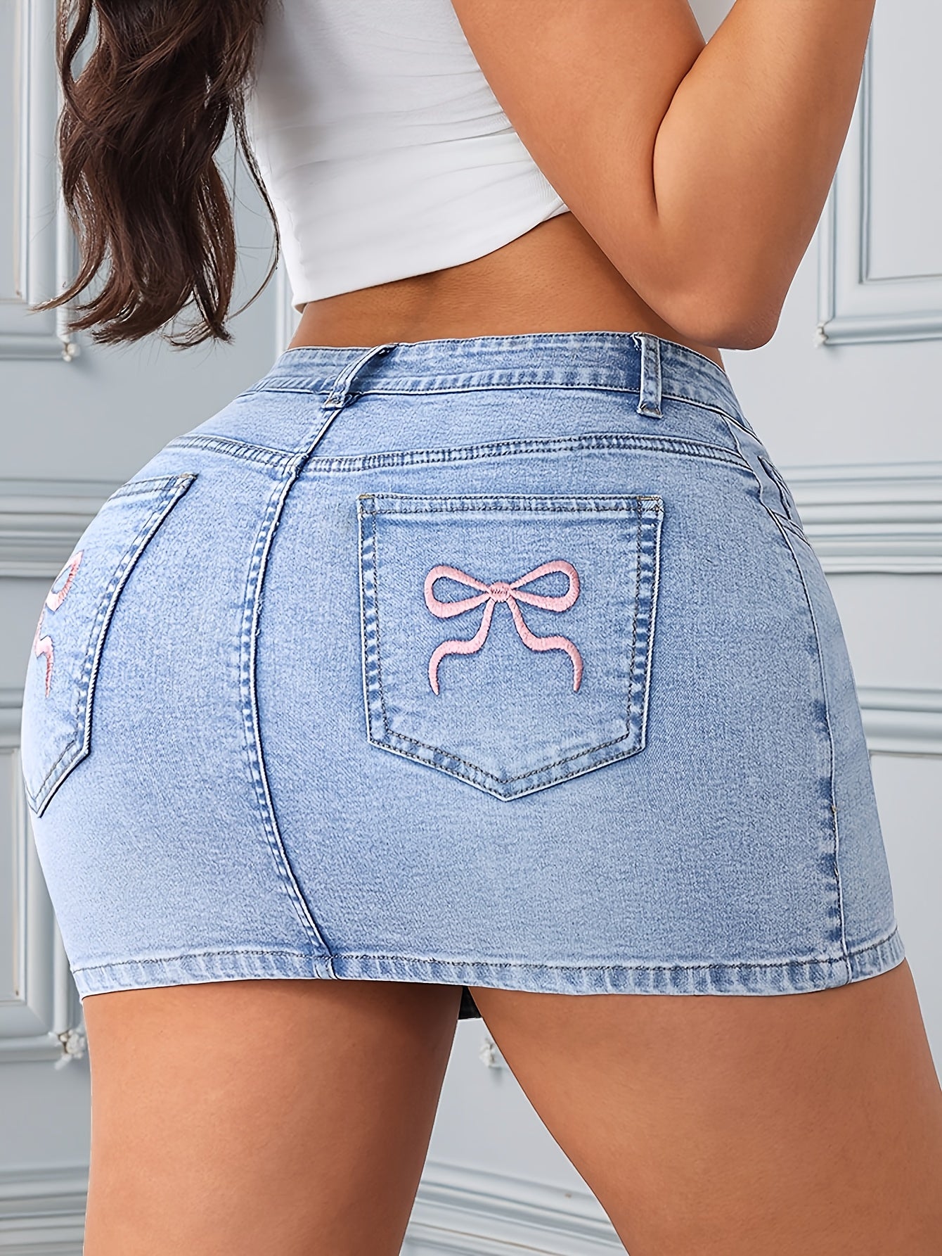 Women's Mini Skirt - Embroidered Pocket Detail detail view