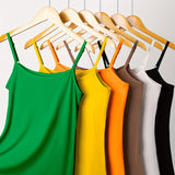 Yellow, orange, dark green, black, white, and brown